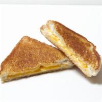 Grilled Cheese Sandwich · 2 slices of cheese on Texas tacos.