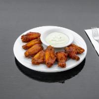 Chicken Wings · Served with french fries or yellow rice.