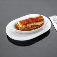 Baked Lasagna · Served with vegetable and garlic bread.