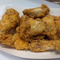 Auntie Shelly's Famous Wings · 10 pieces of Auntie Shelly's Famous Wings with choice of delicious sauces