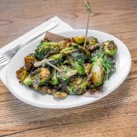 Crispy Brussels Sprouts · Cider agro dulce.