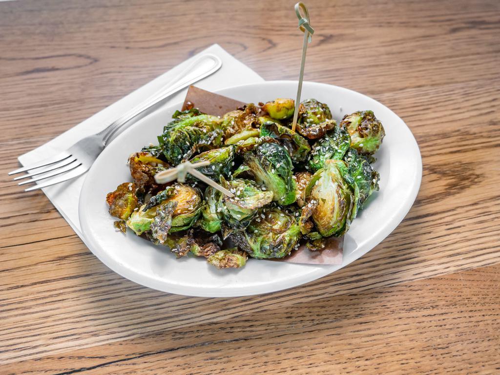 Crispy Brussels Sprouts · Cider agro dulce.