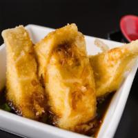 Age Tofu · Fried tofu with bonito flakes and tempura sauce. 