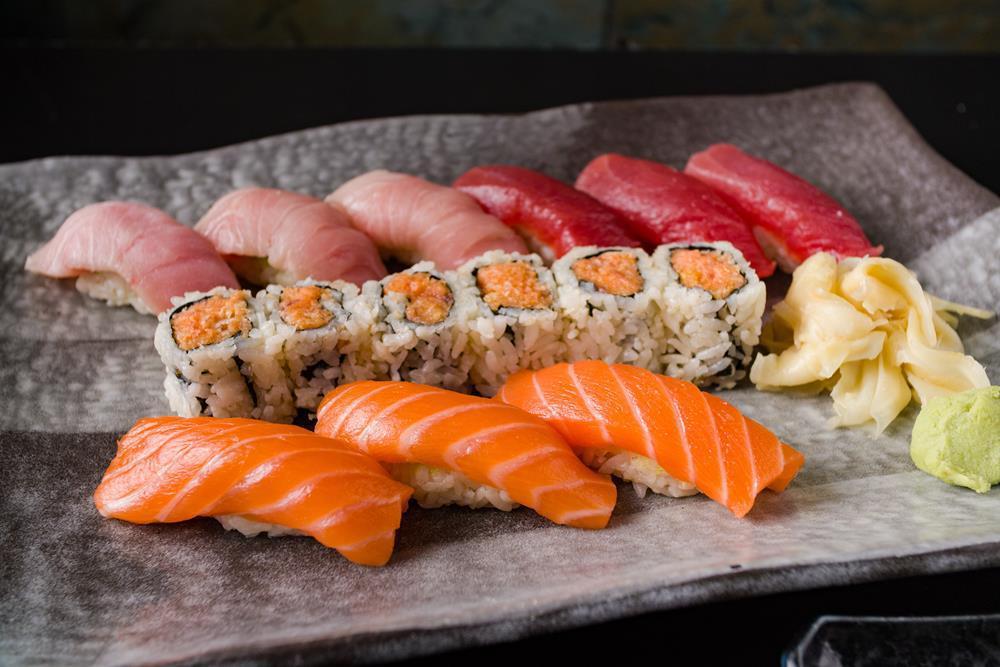 Tricolor Sushi · Three pieces of tuna, salmon and yellowtail with spicy crunchy tuna. Served with soup or salad. 