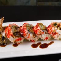 Spider Roll · Soft shell crab, cucumber, tobiko and eel sauce