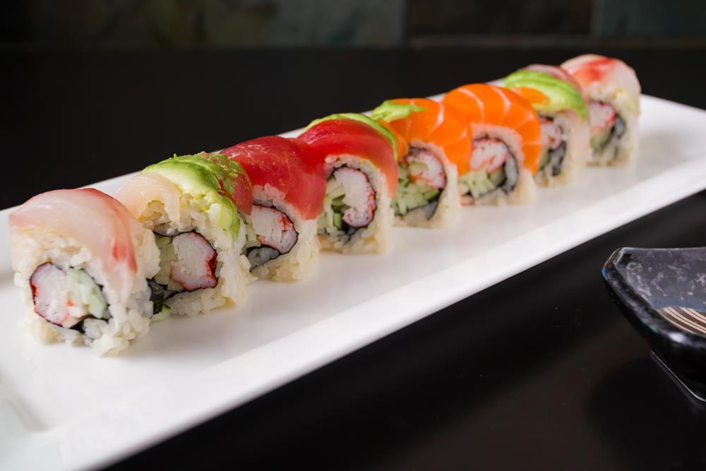 Rainbow Roll · Crab and cucumber with assorted fish on top. 