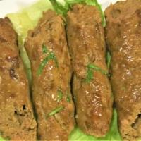 SEEKH KABAB  (Appetizer) · Minced Beef  with onion from skewers cooked in clay oven.