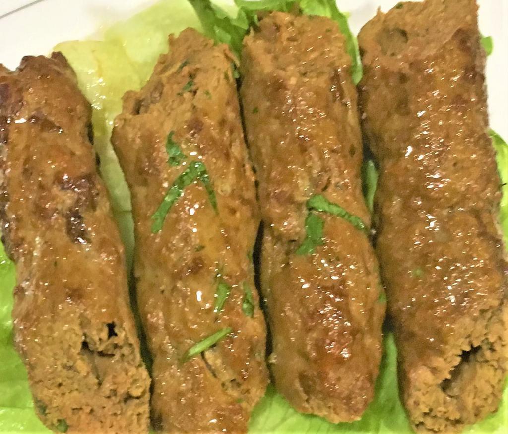 SEEKH KABAB  (Appetizer) · Minced Beef  with onion from skewers cooked in clay oven.