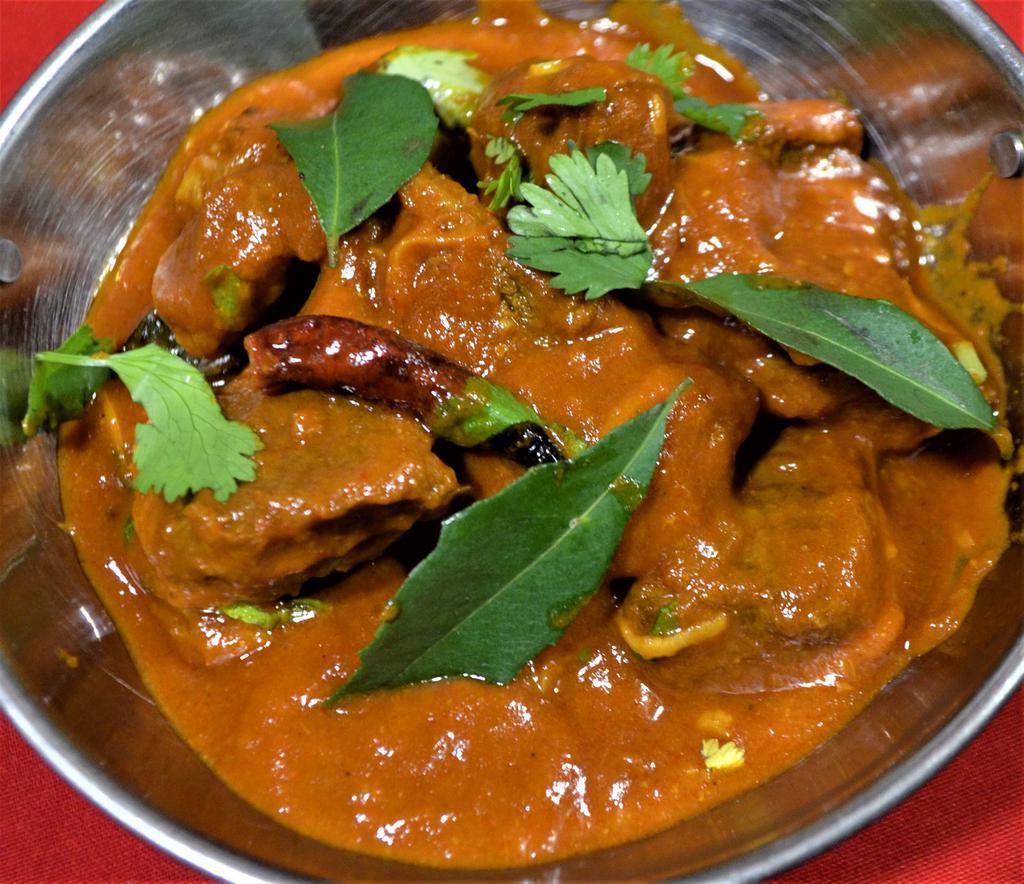 BEEF  MADRAS  (Spicy) · Beef cooked with dry red chilies, coconut, curry leaf, and mustard seed.