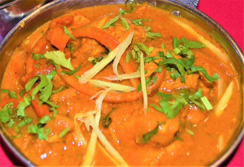 CHICKEN  JALFREZI · Assorted vegetables with spices. Served with rice.