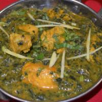 CHICKEN SHAAG · Sauteed with fresh spinach and enhanced with spices. Served with rice.