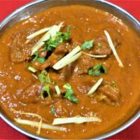 LAMB CURRY · Lamb Cooked w? onion & tomato sauce