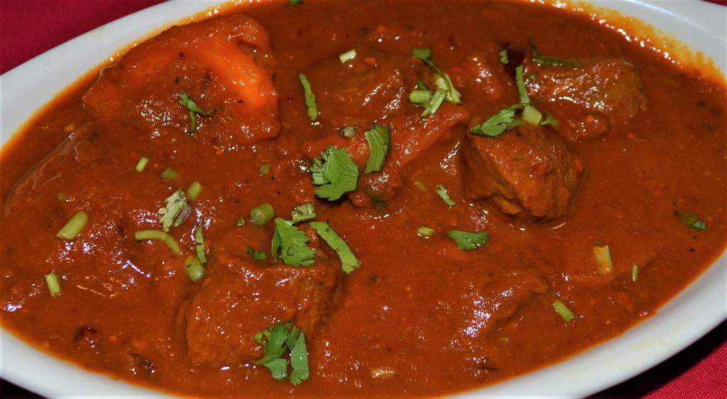 LAMB VINDALOO   (Spicy) · Vinegar, red chilies and spices, make a 
