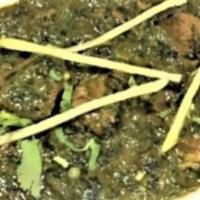 LAMB SHAAG · Sauteed with fresh spinach and enhanced with spices. Served with rice.