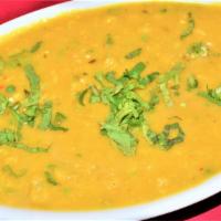 TARKA DALL  (Yellow Daal) · Yellow daal. Served with rice.
