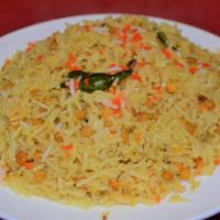 LEMON  RICE · Basmati rice with lemon juice and curry leaves.