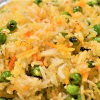 PEAS  POLAO · Saffron rice with peas.