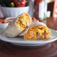 Ham & Eggs · Ham and local organic eggs, sautéed red and yellow bell pepper, white onion, melty cheddar c...
