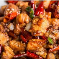 Chilli Chicken · Chicken tenders sauteed with fresh chillies, onions and peppers in a light soya chilli sauce.