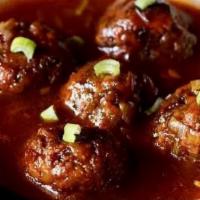 VEGETABLE MANCHURIAN  · Vegetable roundals simmered in a ginger garlic sauce 