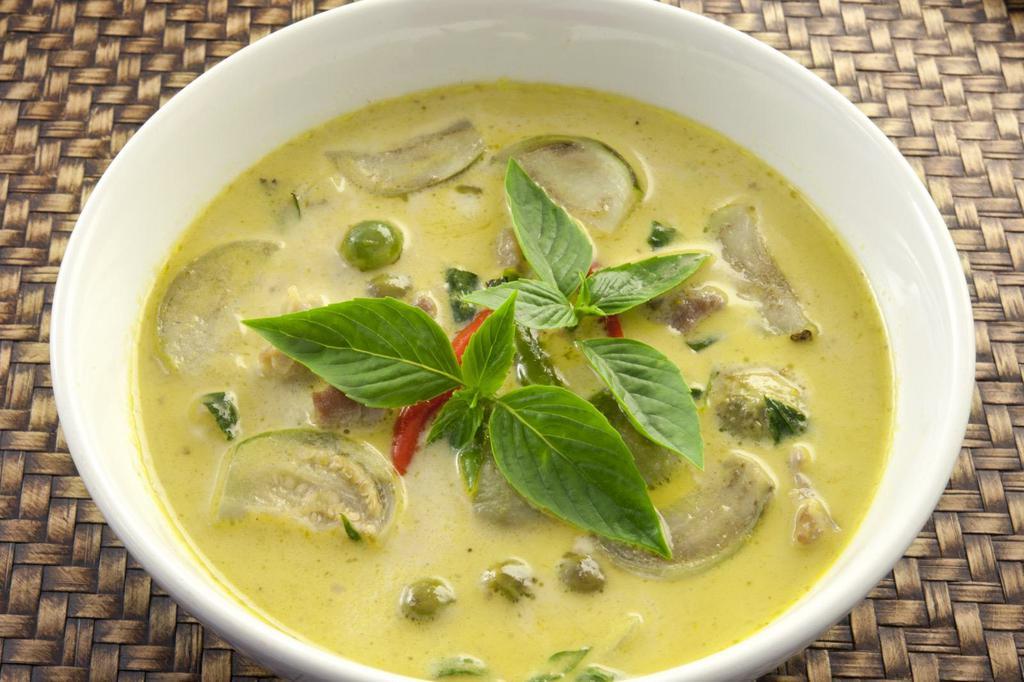 Green Curry (CHICKEN / SHRIMP / TOFU) · Coconut milk with eggplant, peppers, onions, bamboo shoots, lime leaves and basil leaves.