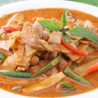Red Curry (CHICKEN / SHRIMP / TOFU) · Coconut milk with eggplant, peppers, onions, bamboo shoots, lime leaves and basil leaves. Sp...