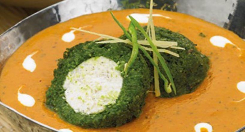 Shyam Savera · Spinach coated cottage cheese dumplings in a rich tomato sauce.