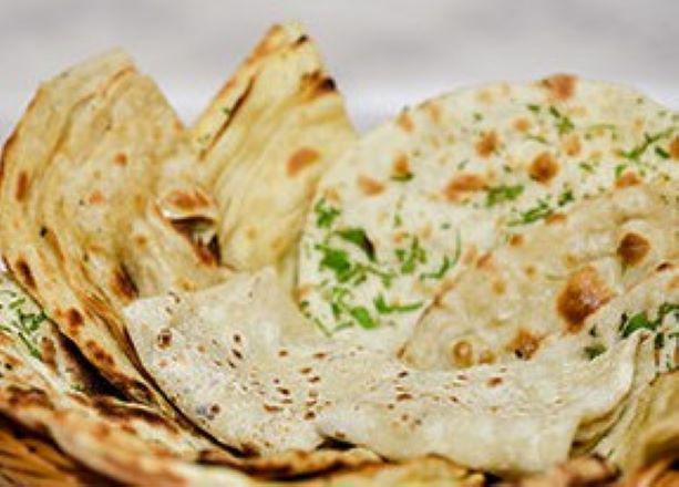 Bread Basket · An assortment from the Indian clay oven of nan, cheese nan, lachha paratha, tandoori roti.