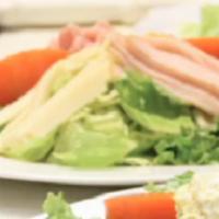 Chef Salad · Freshly cut lettuce, ham, turkey, Swiss and cheddar cheese, tomato, cucumber, onion, sliced ...