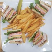 Our Famous 72nd Club Sandwich · Turkey, ham, bacon, lettuce, tomato, cheddar and Swiss cheese.