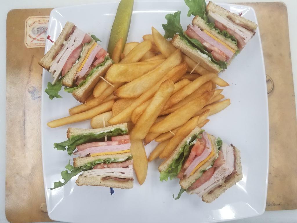 Our Famous 72nd Club Sandwich · Turkey, ham, bacon, lettuce, tomato, cheddar and Swiss cheese.