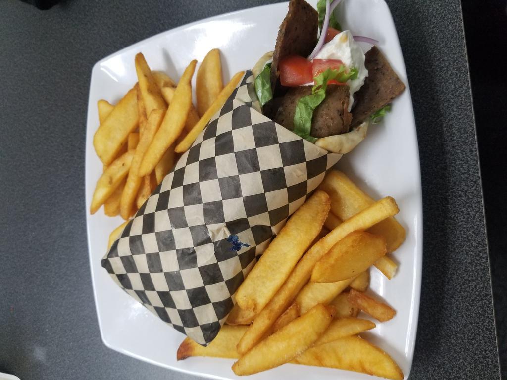 Best Gyro in Town  · Beef and lamb combo, lettuce, tomato, onion, cucumber, feta cheese, our homemade tzatziki sauce and wrapped in pita bread.