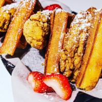 Wanna Southern Belle?  · Crispy deep fried Belgian waffles paired with classic hand breaded chicken tenders. Topped w...