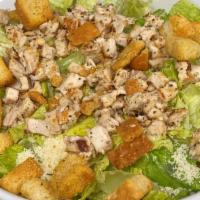 Classic Caesar Salad · Romaine lettuce tossed with Caesar dressing, Parmesan, and croutons. Add grilled chicken for...