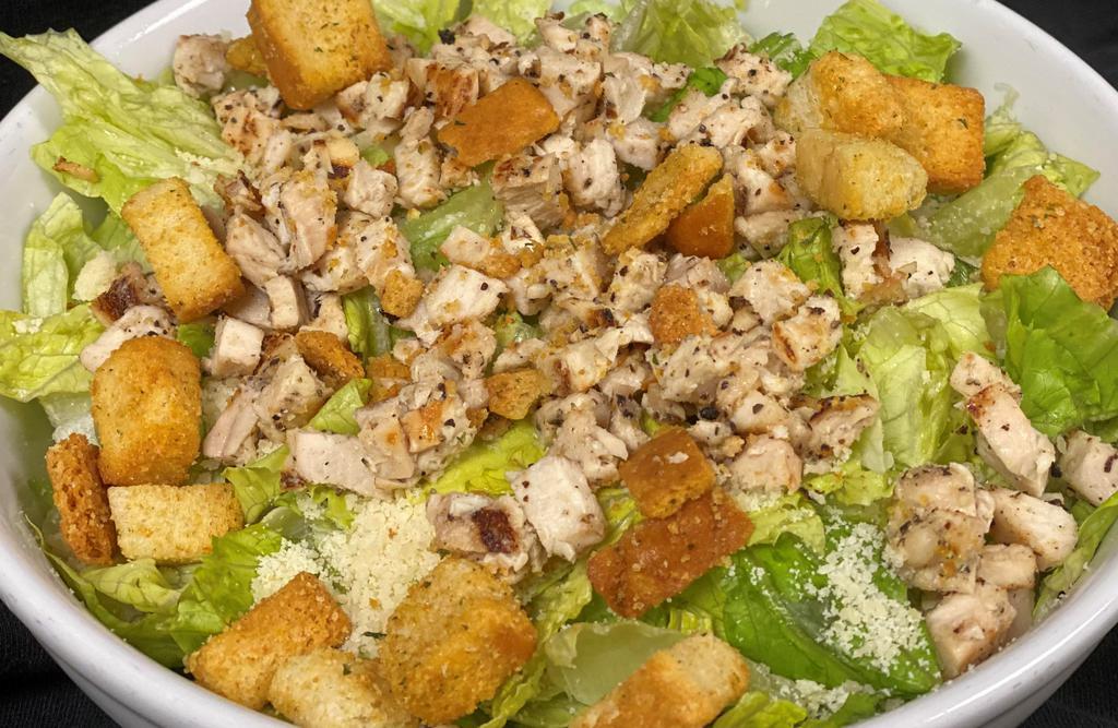 Classic Caesar Salad · Romaine lettuce tossed with Caesar dressing, Parmesan, and croutons. Add grilled chicken for $3.