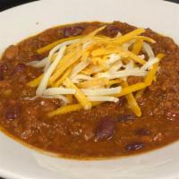 Chili · House made Chili with beef and beans topped with Jack & Cheddar Cheese. Served with Garlic T...