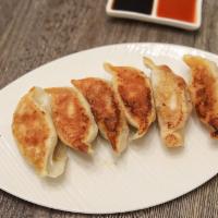 F1. Chive and Pork Pan-Fried Dumplings · 6 pieces.