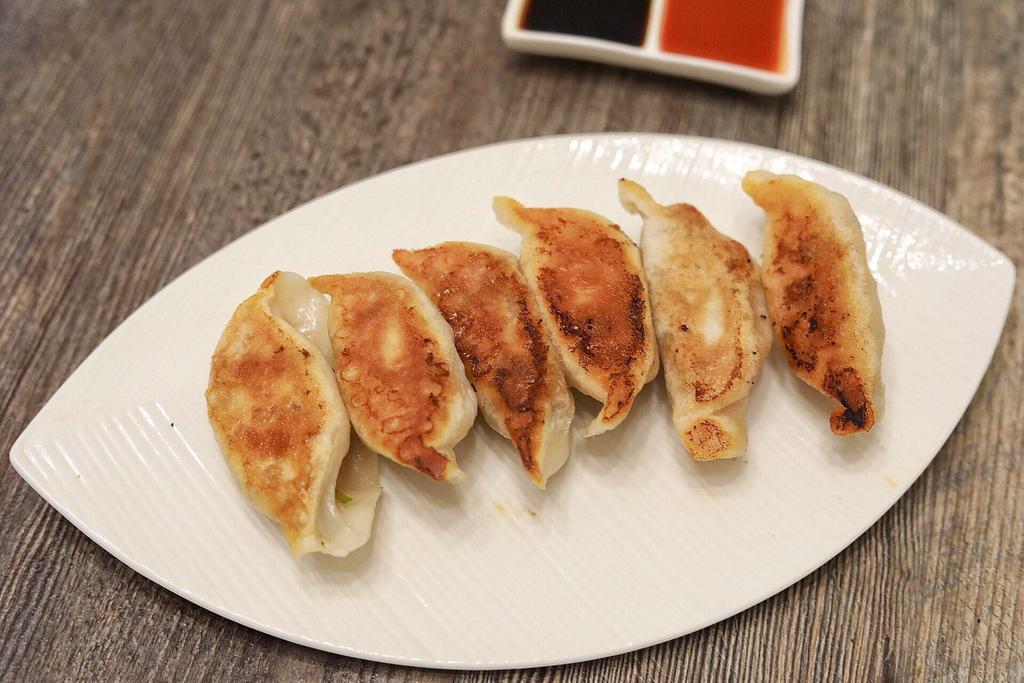 F1. Chive and Pork Pan-Fried Dumplings · 6 pieces.