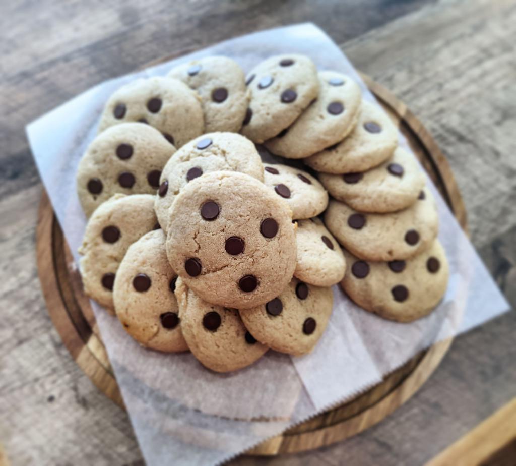 Chocolate Chip Protein Cookie · Gluten free almond flour sweetened with honey and fair trade chocolate chips and grass fed whey protein. No added sugar.