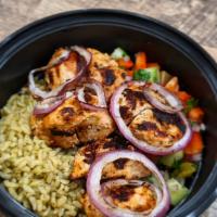 Middle Eastern Chicken Kebab · Marinated Free Range Chicken and Grilled Onion served with Herb Brown Rice and Shepard’s Salad