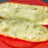 Garlic Bread with Cheese · A cross between garlic bread and pizza, cheesy bread is a quick, easy, and delicious party s...