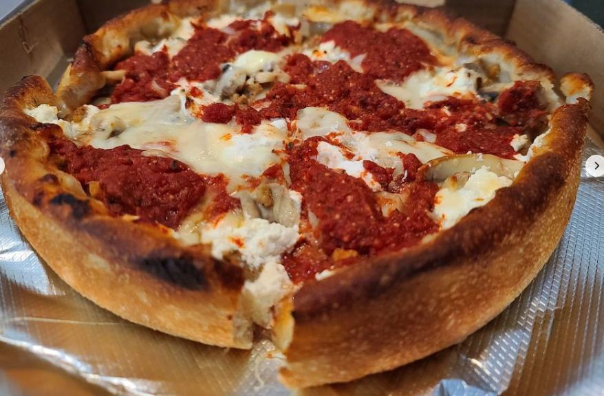 Chicago Classic Deep Dish Pizza · Extra sausage, extra cheese.