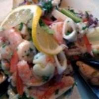 Gluten Free Seafood Salad · Baby shrimp, baby octopus, tender calamari, celery, onions, and tomatoes with our homemade l...