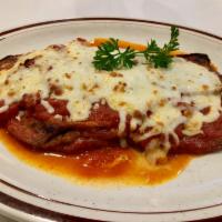 Gluten Free Eggplant Parmigiana · Gluten-free and thinly sliced, our eggplant is layered in our marinara sauce then topped wit...