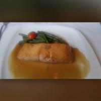 Gluten Free Wild Salmon · Served in lemon white wine sauce infused with shallots.
