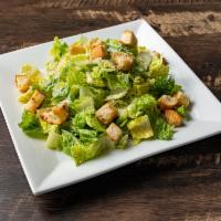 Caesar Salad · Crisp romaine tossed with croutons, Caesar dressing and grated cheese.