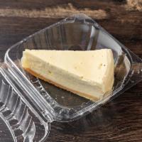 NY Cheesecake · Classic New York cheesecake with a creamy satiny texture.