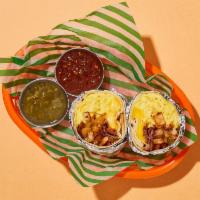 Morning Bacon Breakfast Burrito · Two scrambled eggs with crispy bacon, crispy potatoes, melted cheese, and caramelized onions...