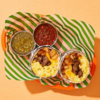 Sleepy Sausage Breakfast Burrito · Two scrambled eggs with delicious breakfast sausage, crispy potatoes, melted cheese, and car...