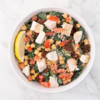 Gluten-Free Kale Caesar Salad · Shredded kale, parmesan cheese, chickpeas, diced tomatoes, vegan caesar dressing, lemon wedg...